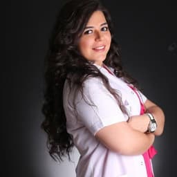 Dentist Asel Üsdat